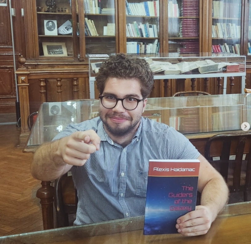 photo of Alexis holding a book